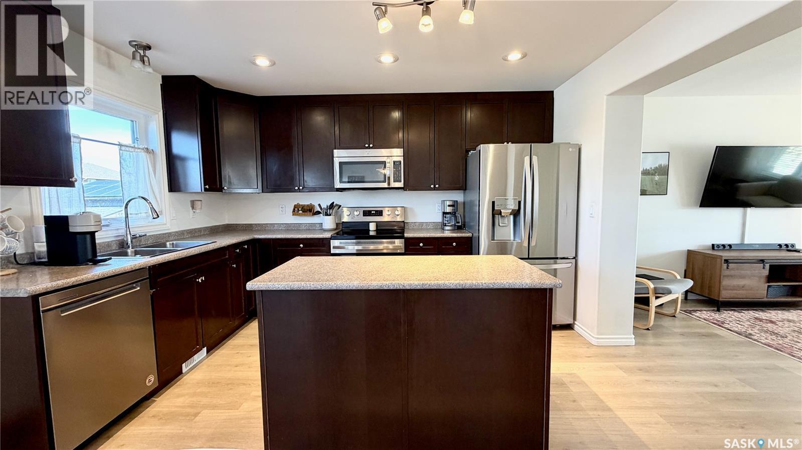 230 Veltkamp Lane, Saskatoon, SK - Indoor Photo Showing Kitchen With Double Sink
