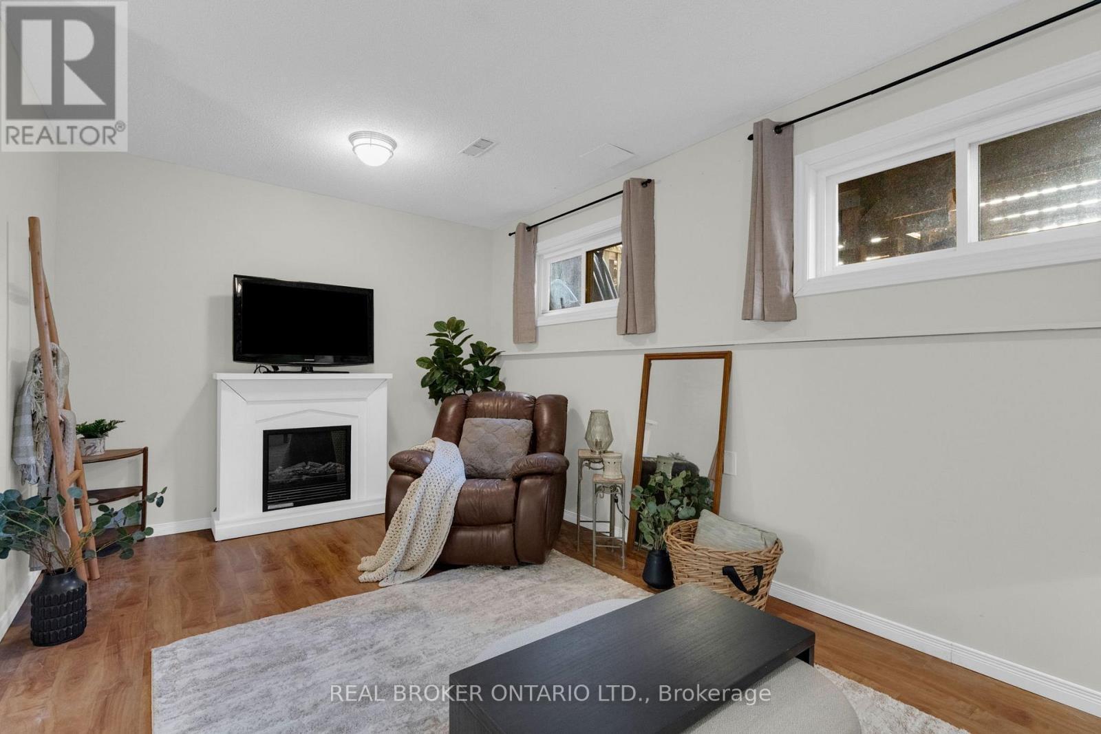 4 Parkside Crescent, Essa, ON - Indoor With Fireplace