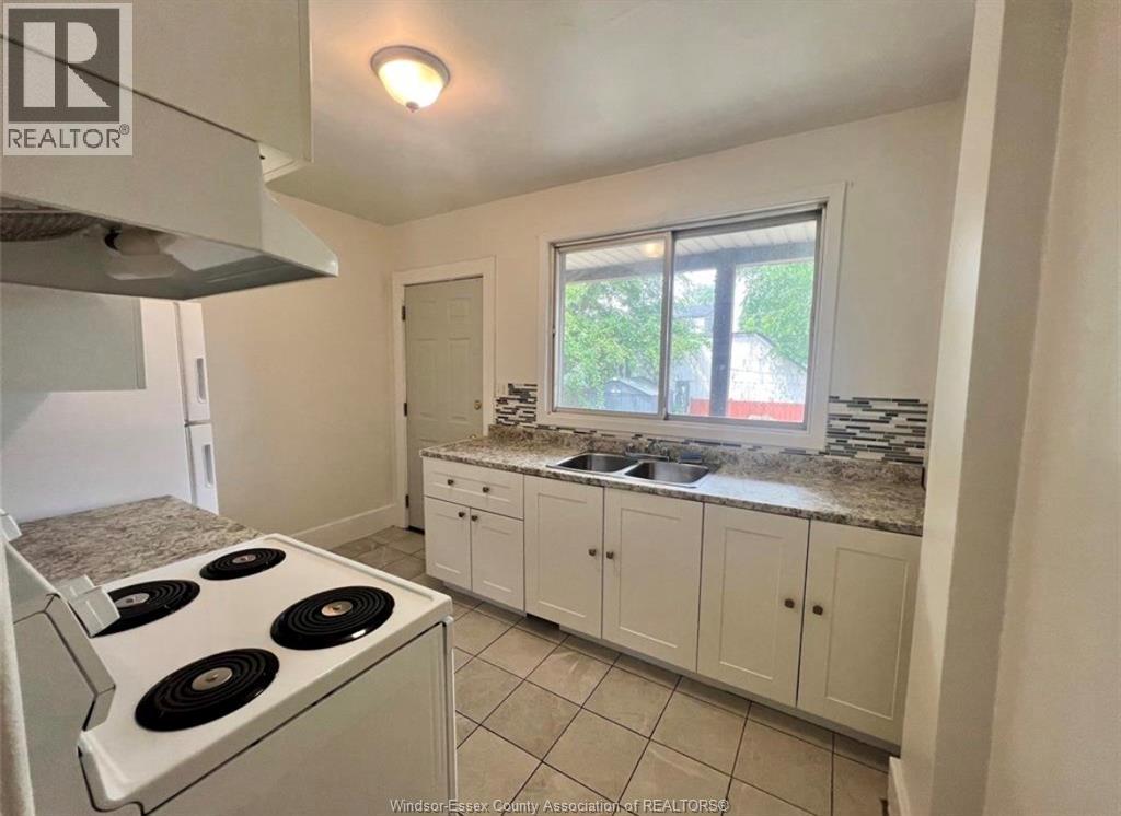 3458 Harris, Windsor, ON - Indoor Photo Showing Kitchen With Double Sink