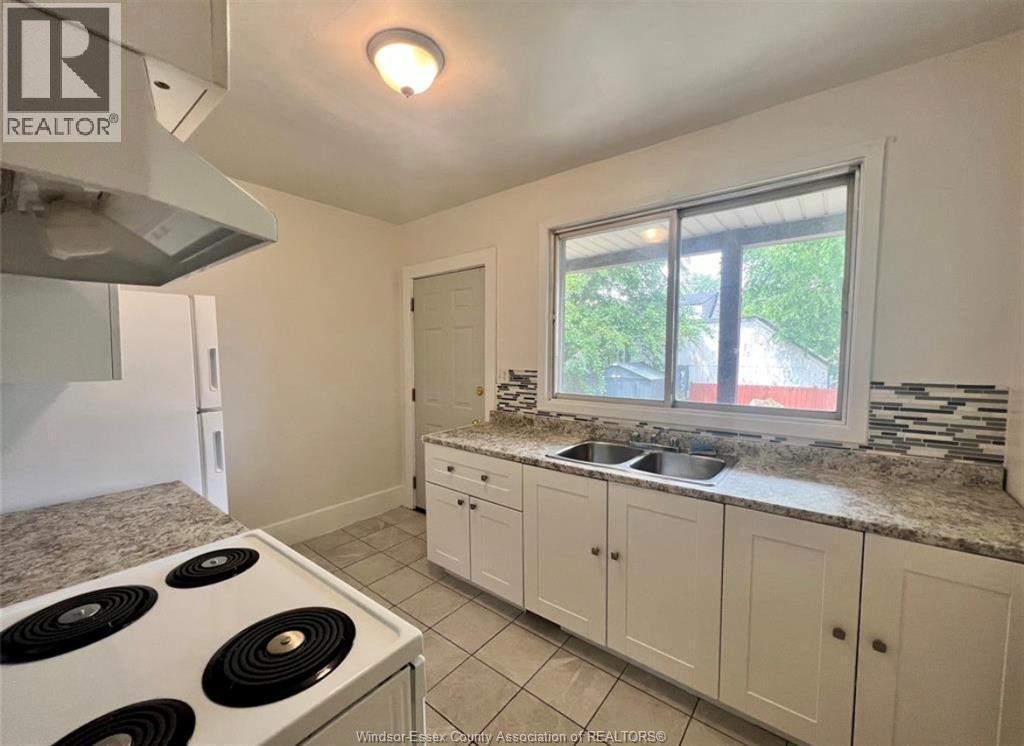 3458 Harris, Windsor, ON - Indoor Photo Showing Kitchen With Double Sink