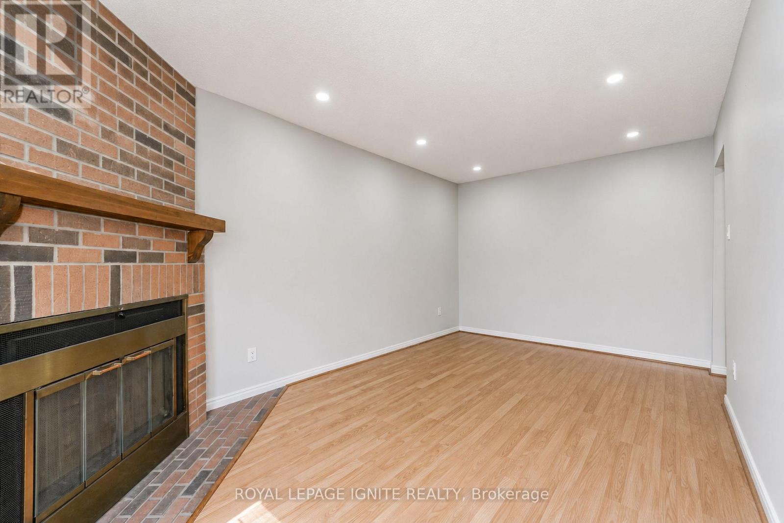 furniture virtually removed - 21 Halfmoon Square, Toronto, ON - Indoor Photo Showing Other Room With Fireplace