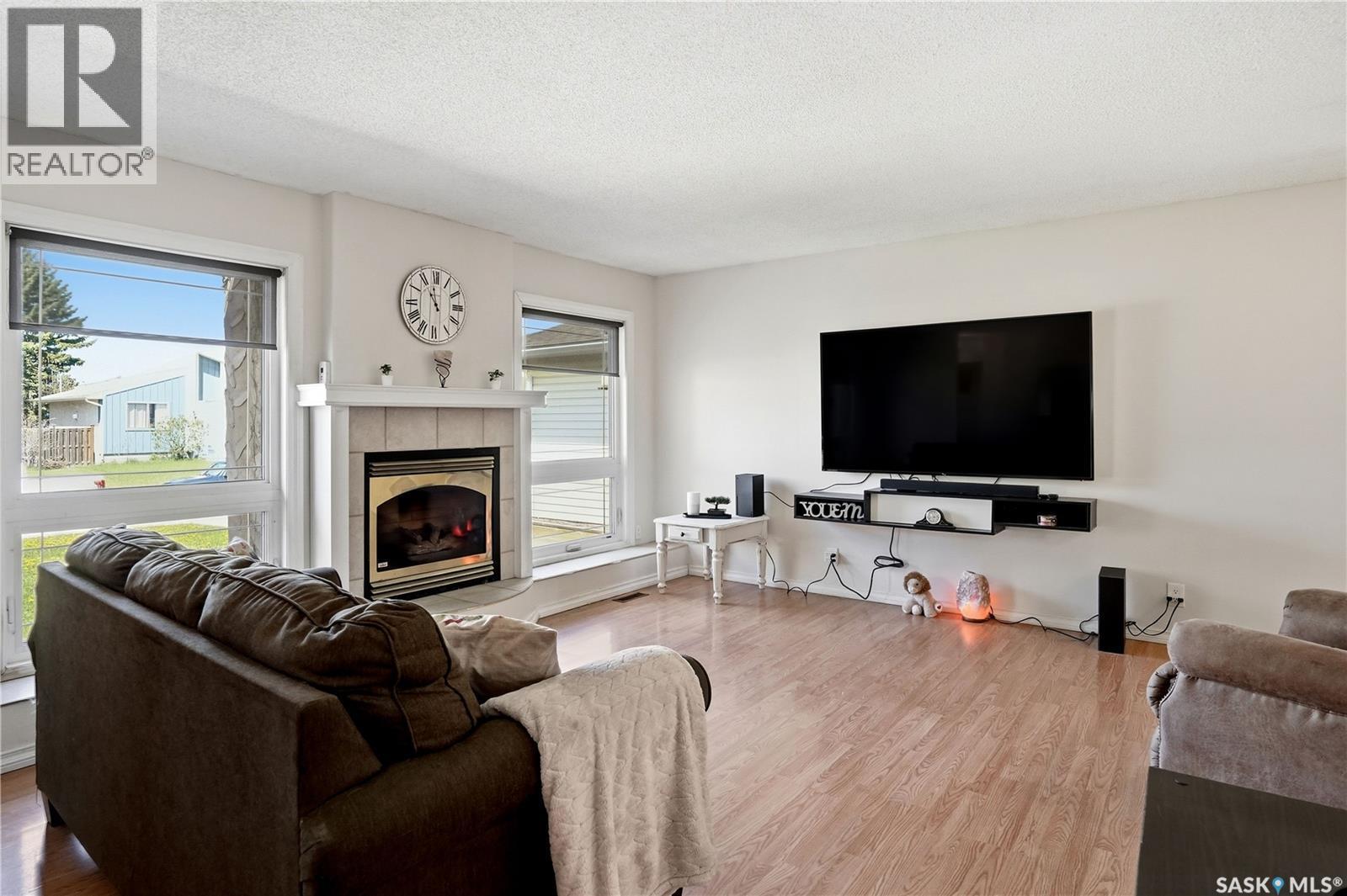 1009 Corman Crescent, Moose Jaw, SK - Indoor Photo Showing Living Room With Fireplace
