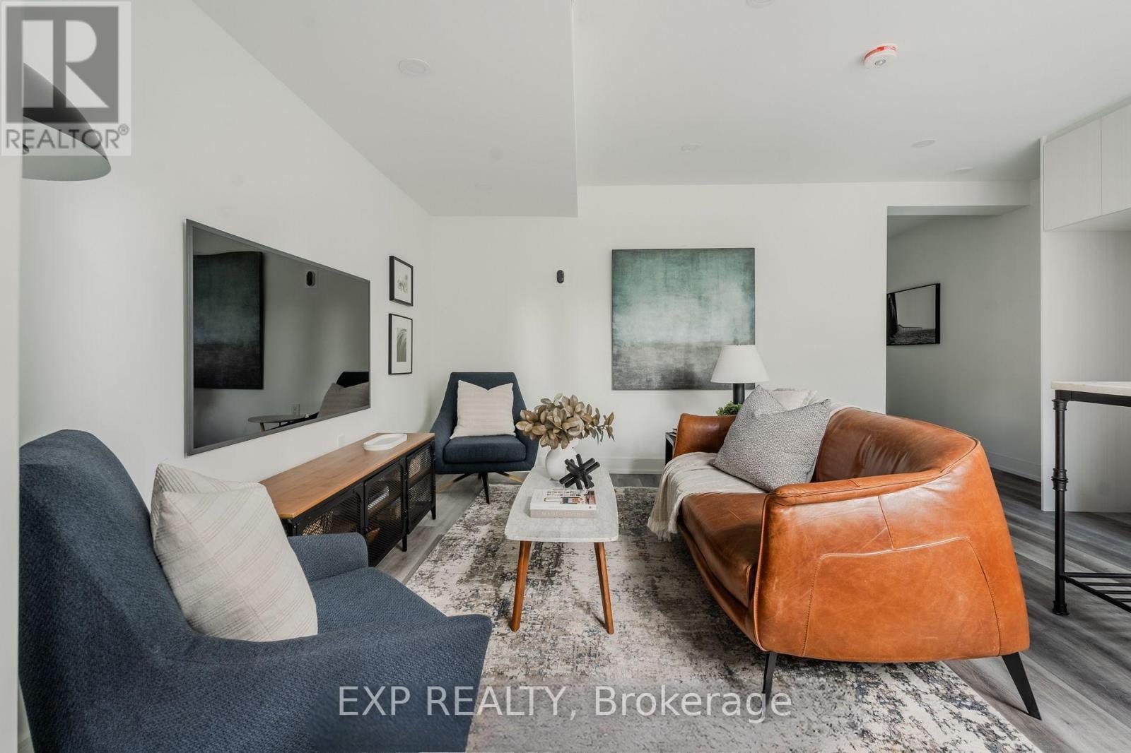 Lower - 19 Devon Road, Toronto, ON - Indoor Photo Showing Living Room