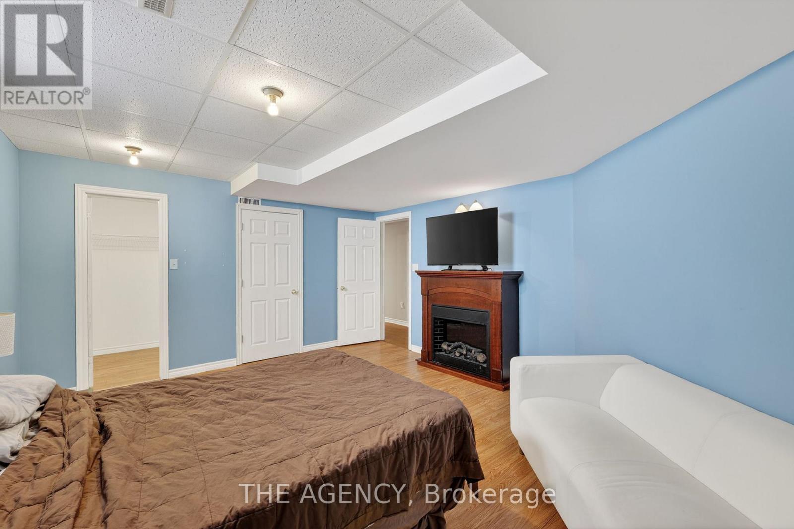 21 Silver Trail, Barrie, ON - Indoor Photo Showing Bedroom With Fireplace