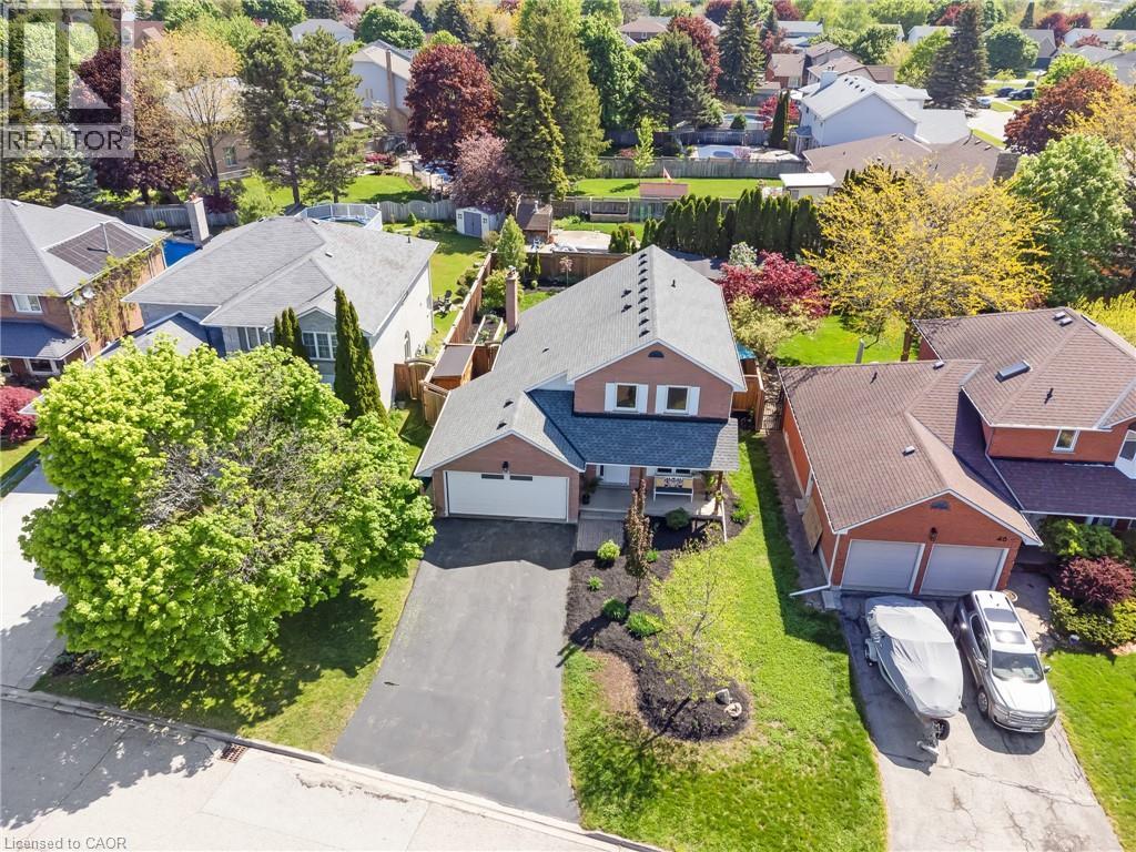 Two-story home with an attached two-car garage and a paved driveway - 42 Handorf Drive, Cambridge, ON - Outdoor