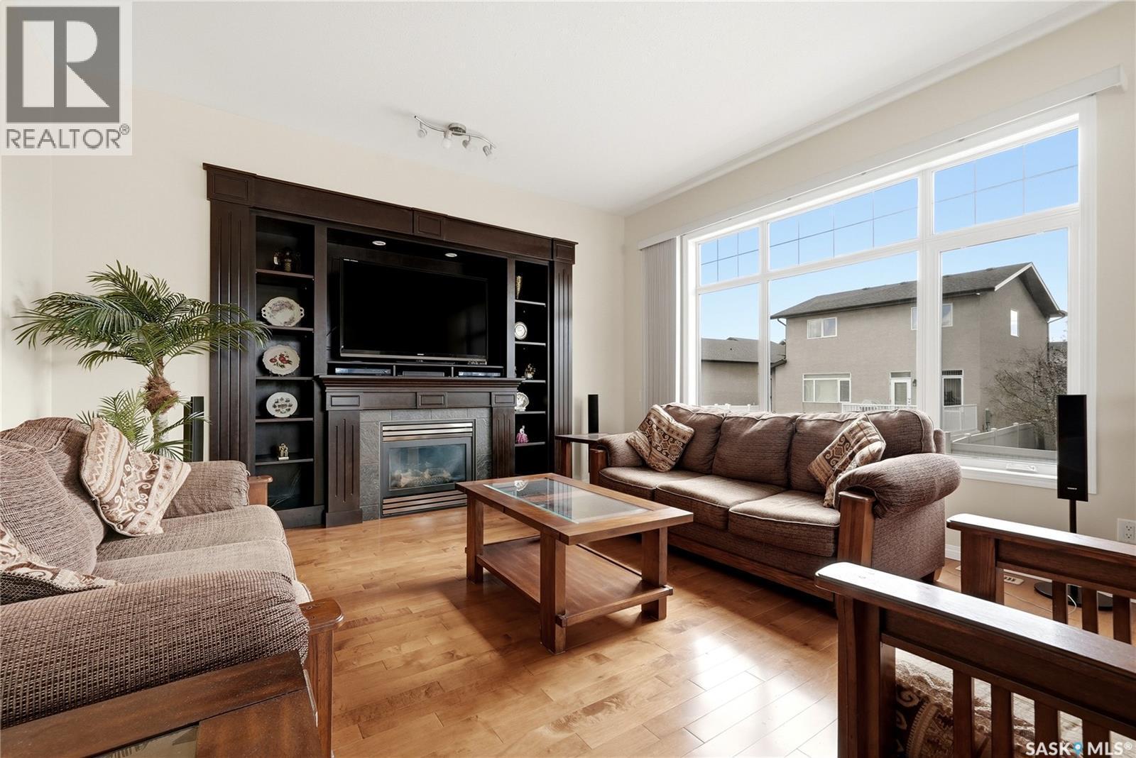 2534 Windsor Park Road, Regina, SK - Indoor Photo Showing Living Room With Fireplace
