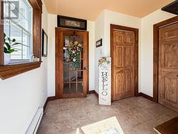 Side entry with laundry closet -