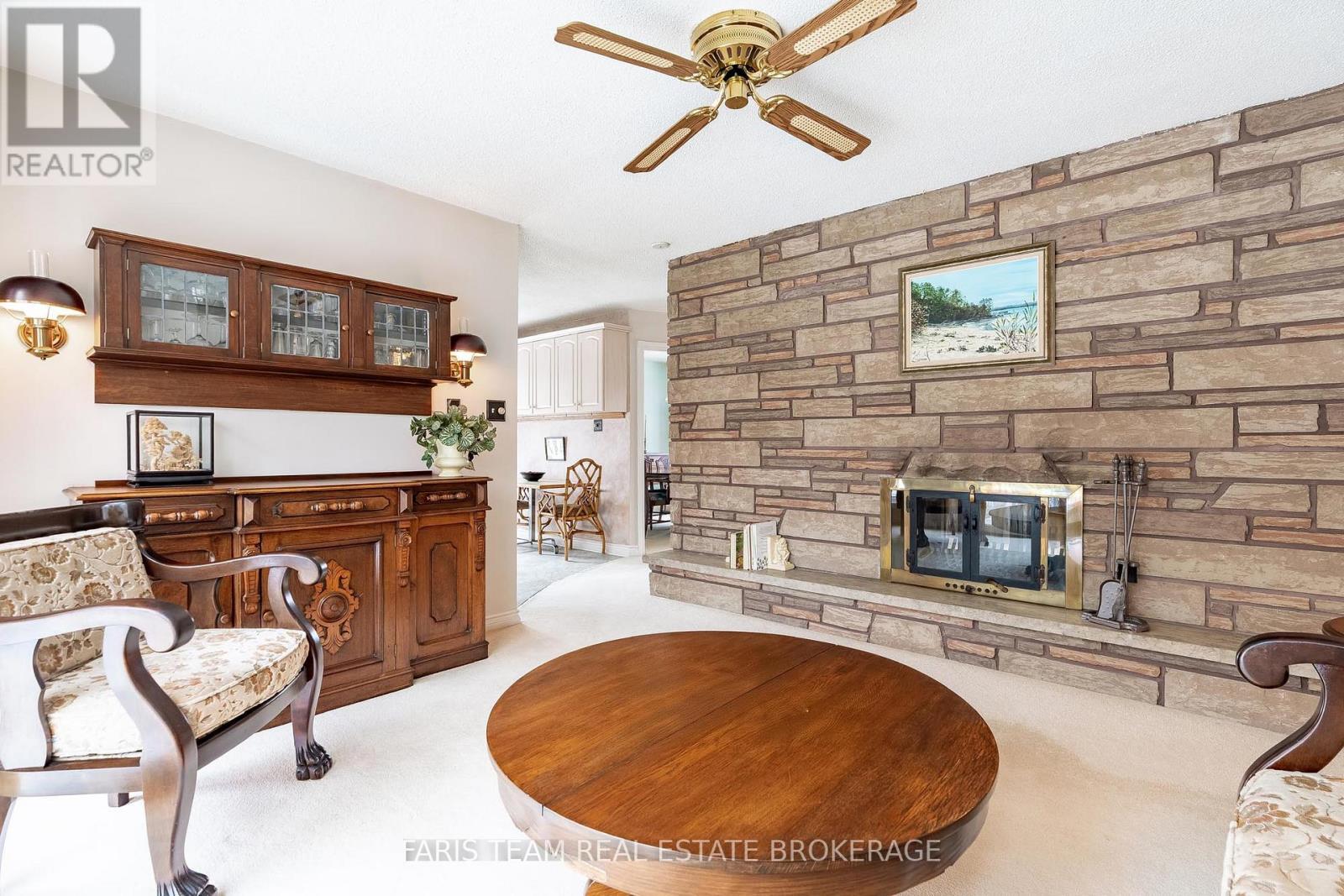 21 Pooles Road, Springwater, ON - Indoor With Fireplace