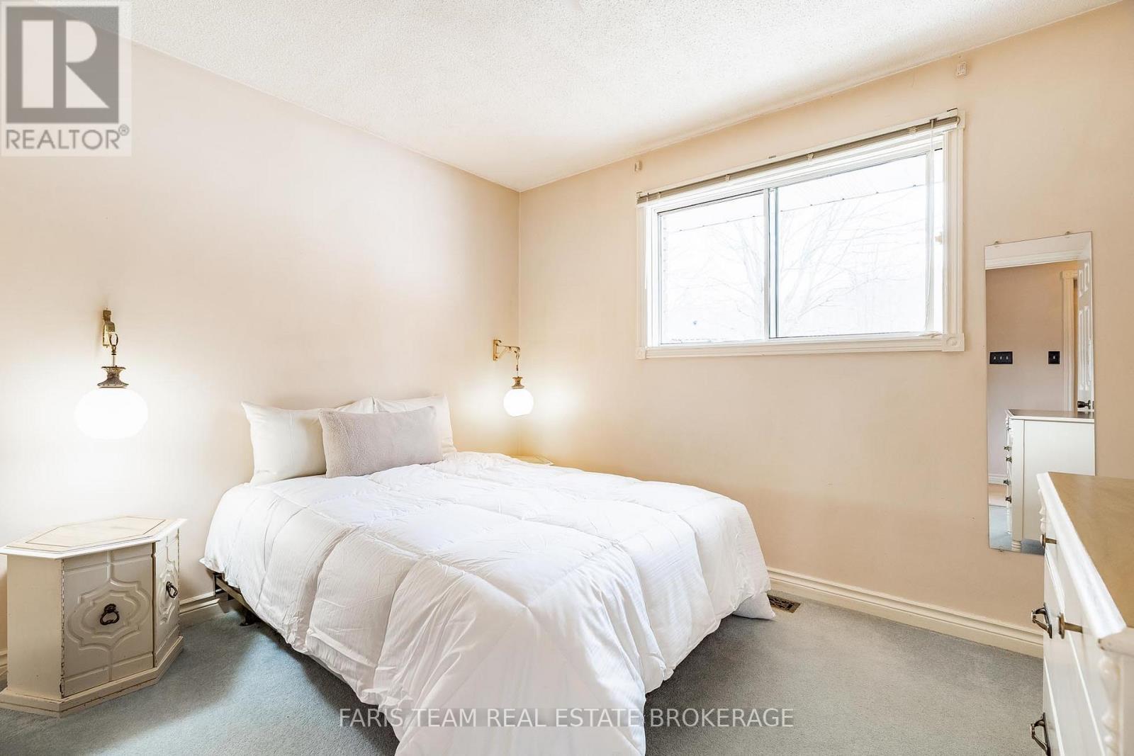 21 Pooles Road, Springwater, ON - Indoor Photo Showing Bedroom