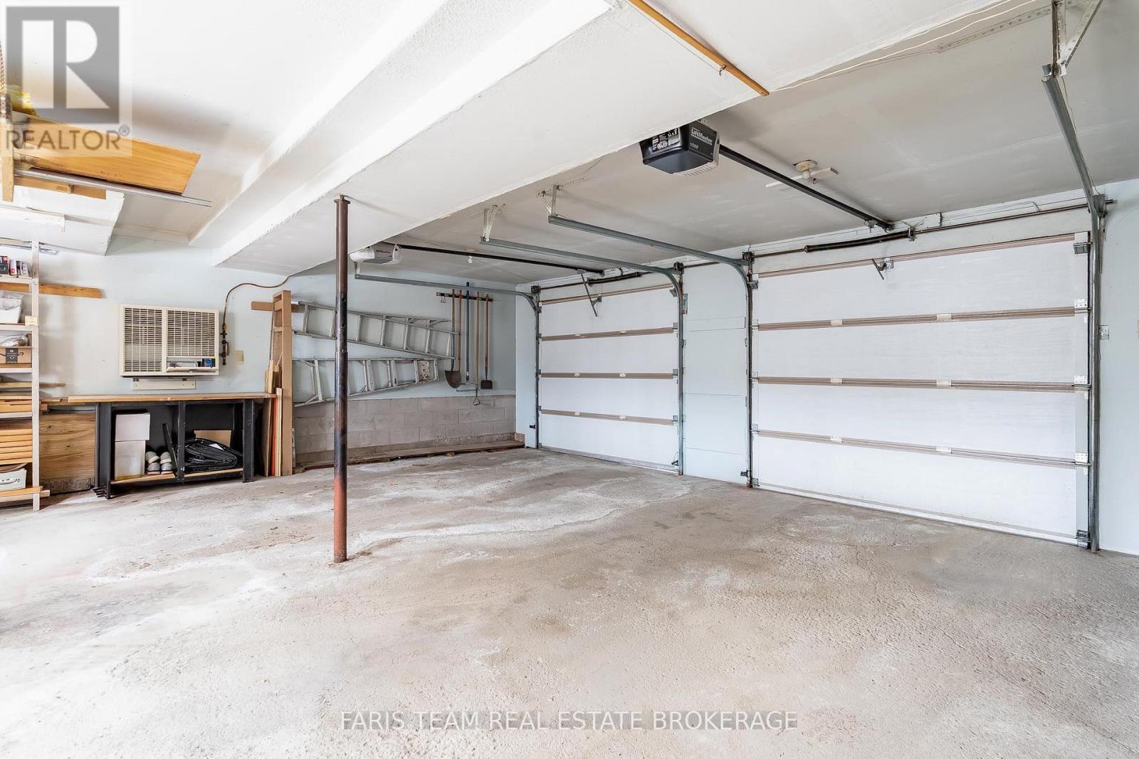 21 Pooles Road, Springwater, ON - Indoor Photo Showing Garage
