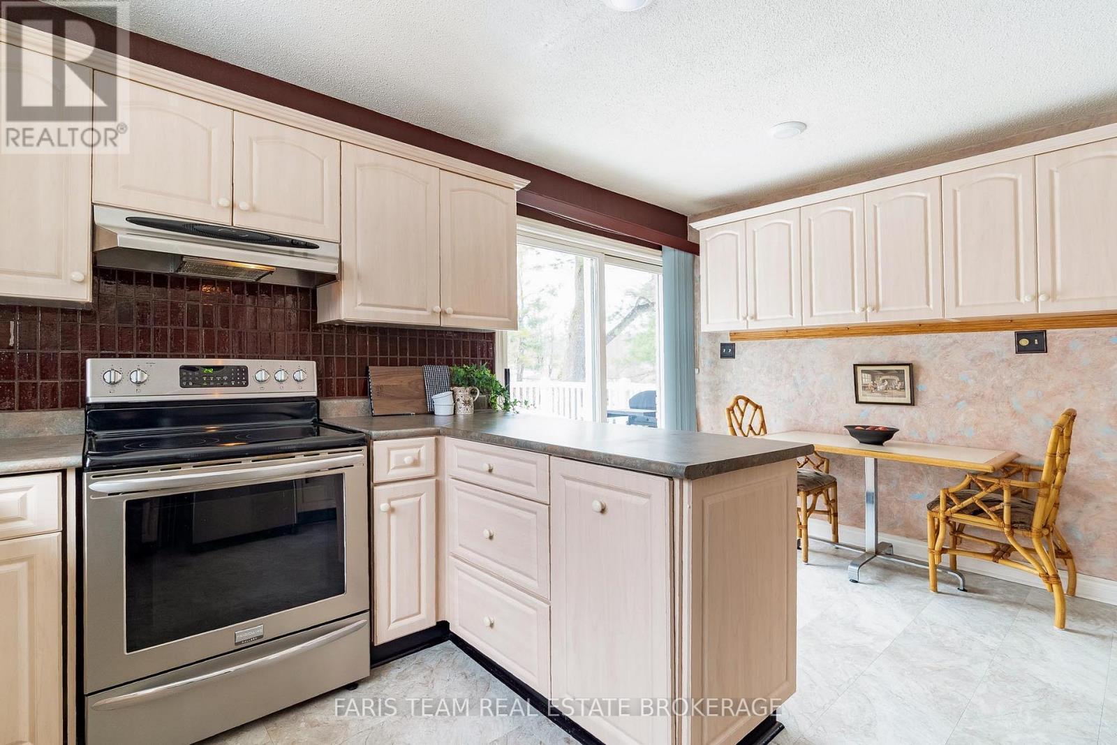 21 Pooles Road, Springwater, ON - Indoor Photo Showing Kitchen