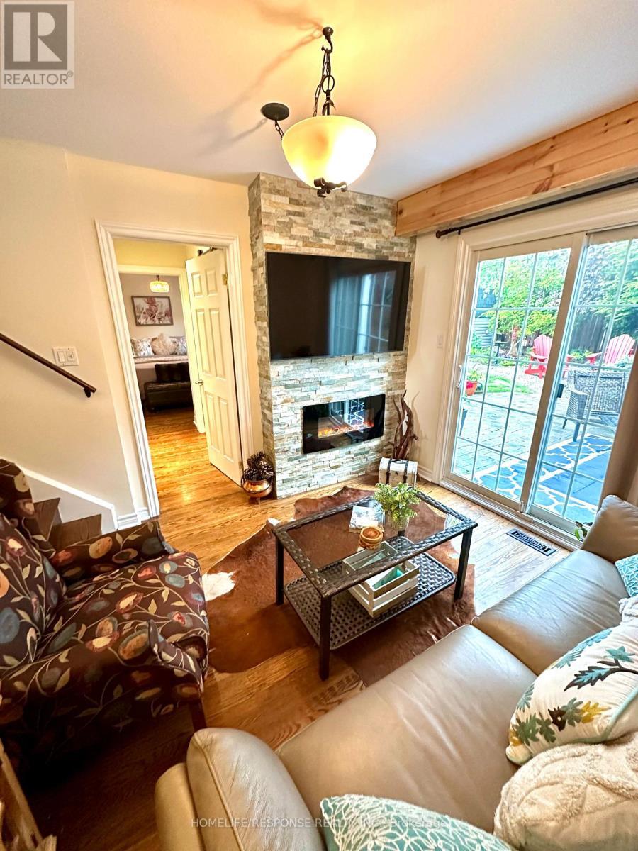 3430 Homark Drive, Mississauga, ON - Indoor Photo Showing Living Room With Fireplace