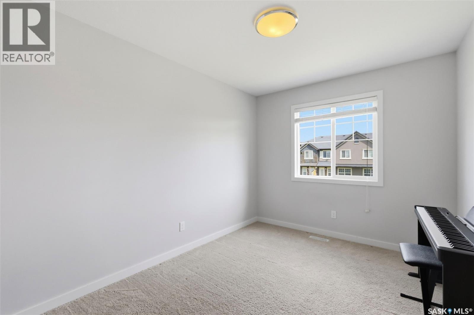 427 1303 Paton Crescent, Saskatoon, SK - Indoor Photo Showing Other Room