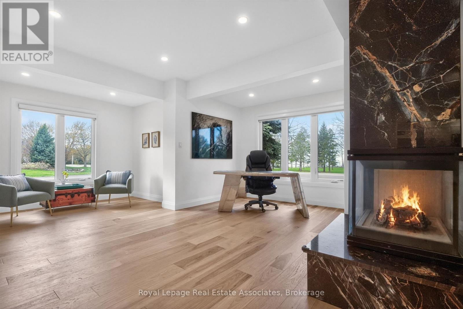 382 Nelles Road N, Grimsby, ON - Indoor Photo Showing Living Room With Fireplace
