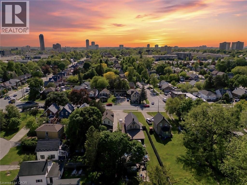 Aerial perspective of a residential neighborhood featuring detached homes with varied architectural styles - 87 Lancaster Street W, Kitchener, ON - Outdoor With View
