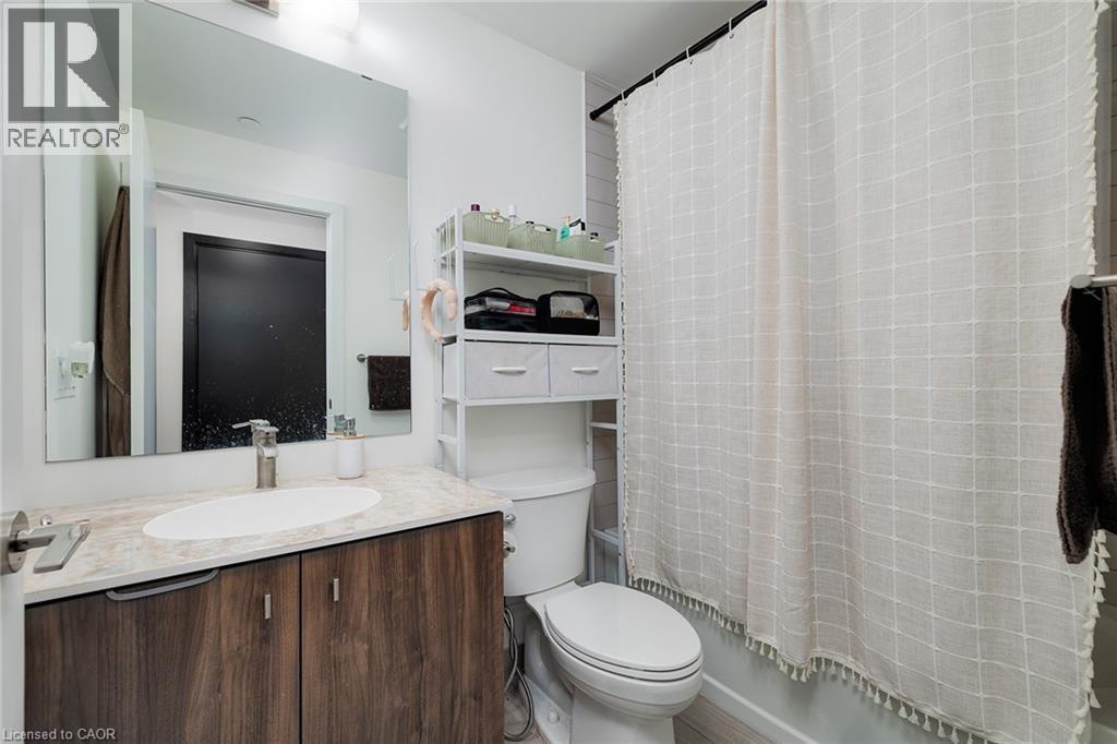 Full bathroom featuring shower / tub combo, vanity, and toilet - 15 Wellington Street S Unit# 1909, Kitchener, ON - Indoor Photo Showing Bathroom