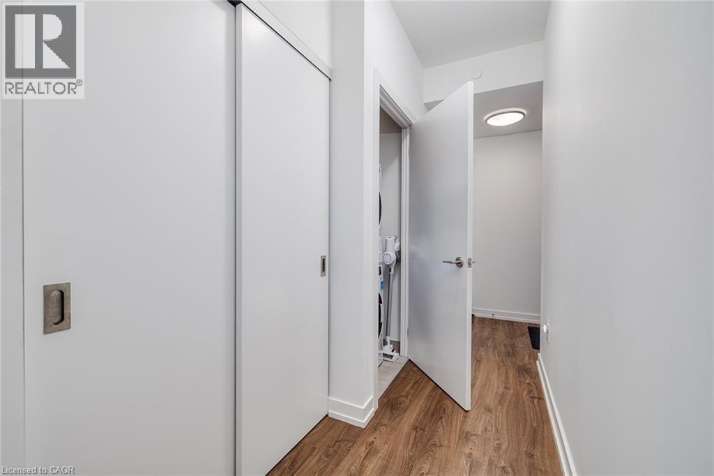 Hall with hardwood / wood-style flooring - 15 Wellington Street S Unit# 1909, Kitchener, ON - Indoor Photo Showing Other Room