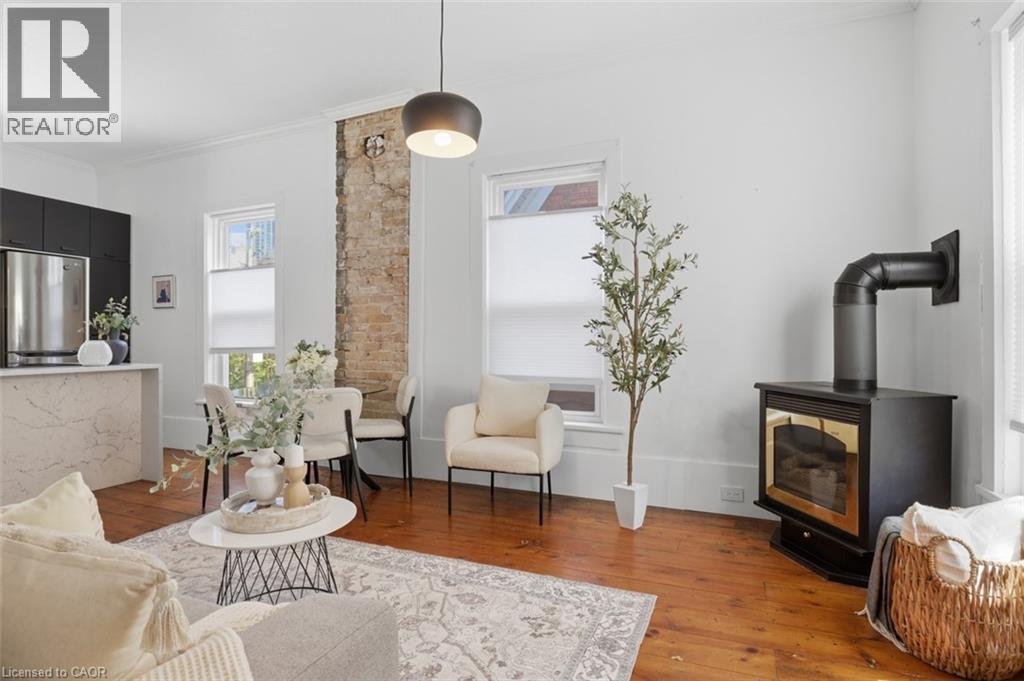 53 Eby Street S, Kitchener, ON - Indoor Photo Showing Living Room With Fireplace