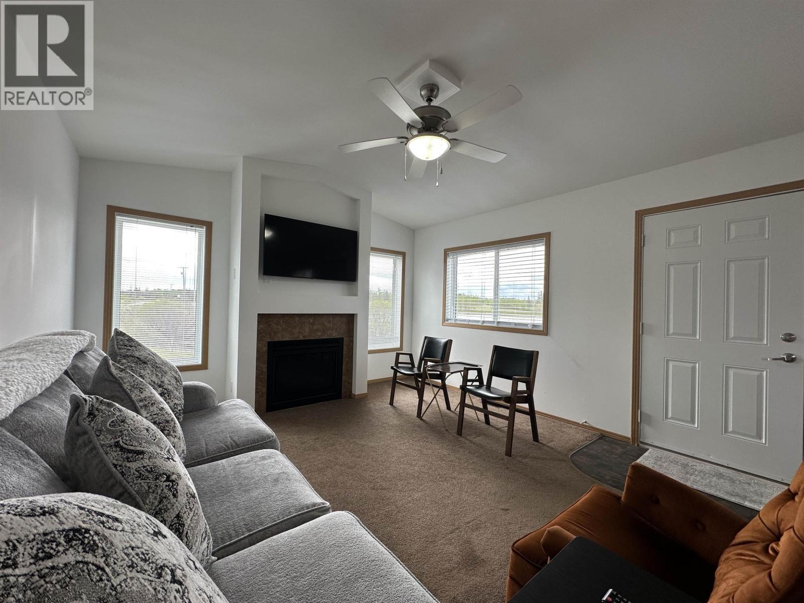 2510 North Bonaparte Road, 70 Mile House, BC - Indoor Photo Showing Living Room With Fireplace