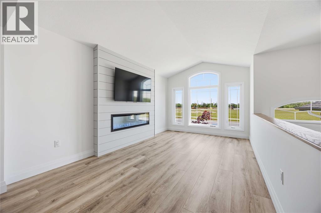 519 Mint Julep Drive, St Clair, ON - Indoor Photo Showing Living Room With Fireplace