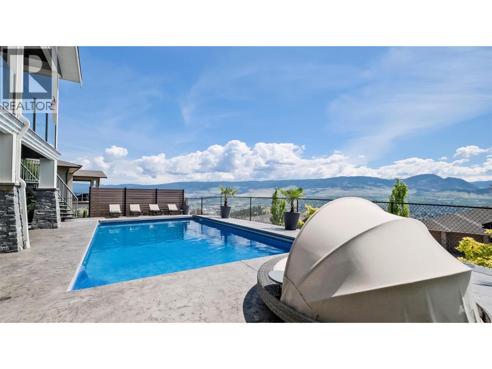 593 Harrogate Lane, Kelowna, BC - Outdoor With In Ground Pool