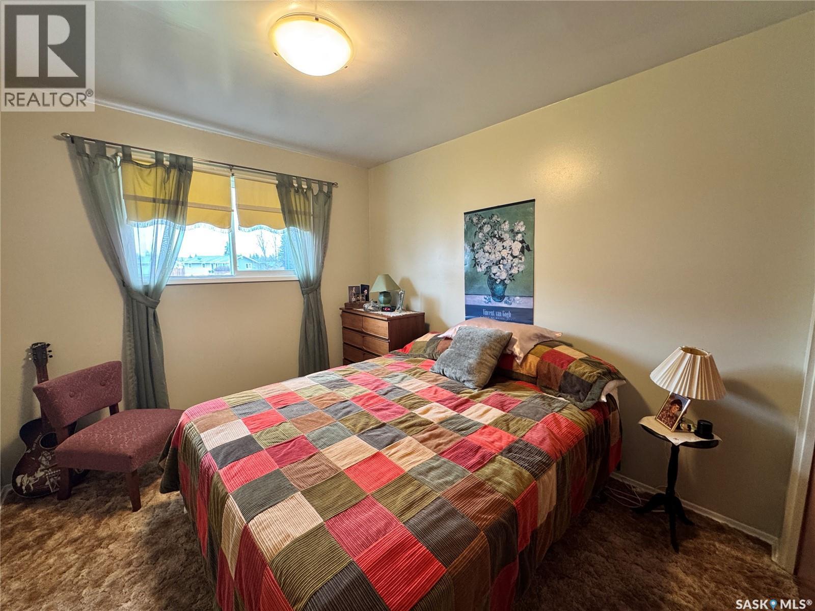 423 7Th Avenue W, Biggar, SK - Indoor Photo Showing Bedroom