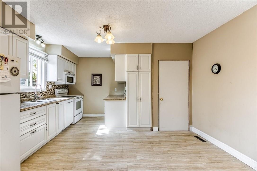 60 Allan, Coniston, ON - Indoor Photo Showing Kitchen With Double Sink