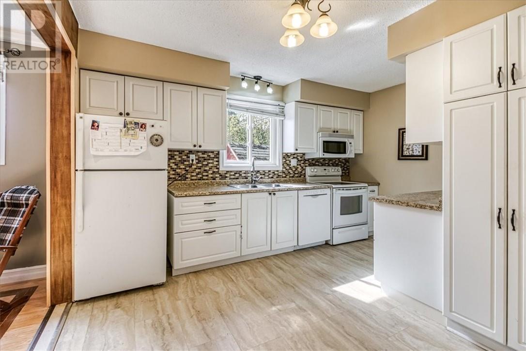 60 Allan, Coniston, ON - Indoor Photo Showing Kitchen With Double Sink
