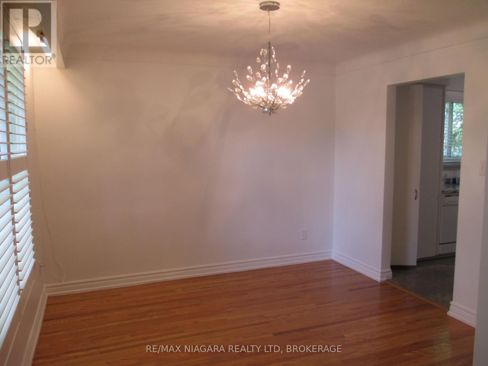 DINING ROOM WITH DOORWAY INTO KITCHEN - 1452 Garrison Road, Fort Erie (Crescent Park), ON - Indoor Photo Showing Other Room