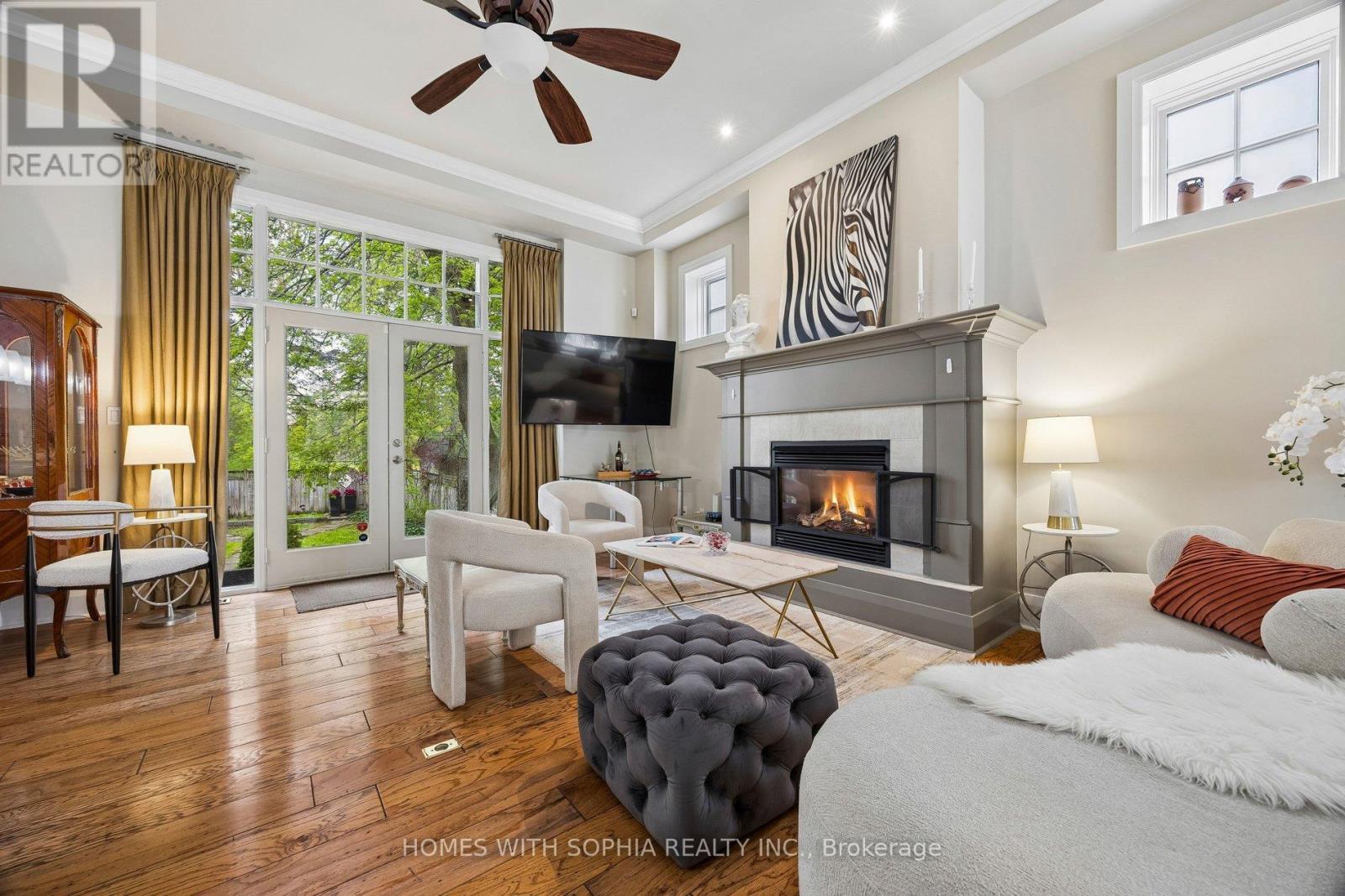 Family room - 162 Glenvale Boulevard, Toronto, ON - Indoor Photo Showing Living Room With Fireplace