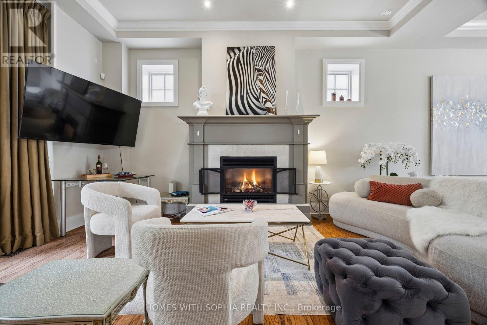 Family room - 162 Glenvale Boulevard, Toronto, ON - Indoor Photo Showing Living Room With Fireplace
