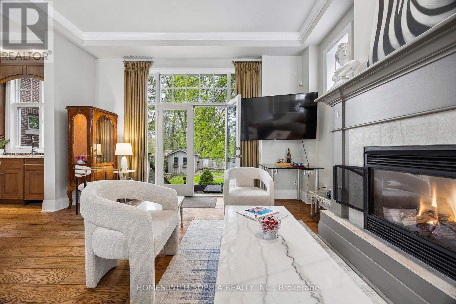 Family room - 162 Glenvale Boulevard, Toronto, ON - Indoor Photo Showing Living Room With Fireplace