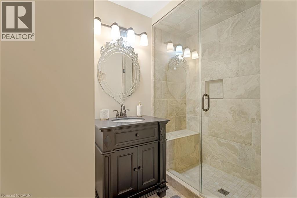 Full bath with a shower stall and vanity - 46 Herkimer Street Unit# 2, Hamilton, ON - Indoor Photo Showing Bathroom