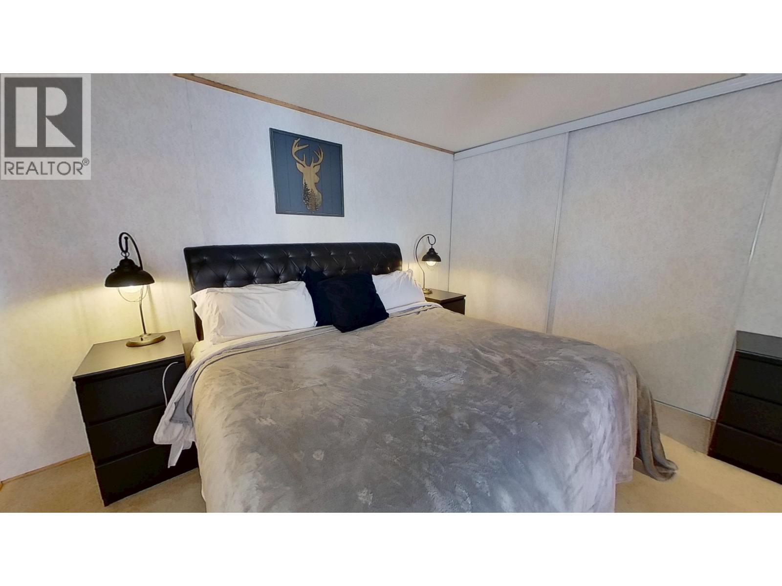 10074 99 Street, Taylor, BC - Indoor Photo Showing Bedroom
