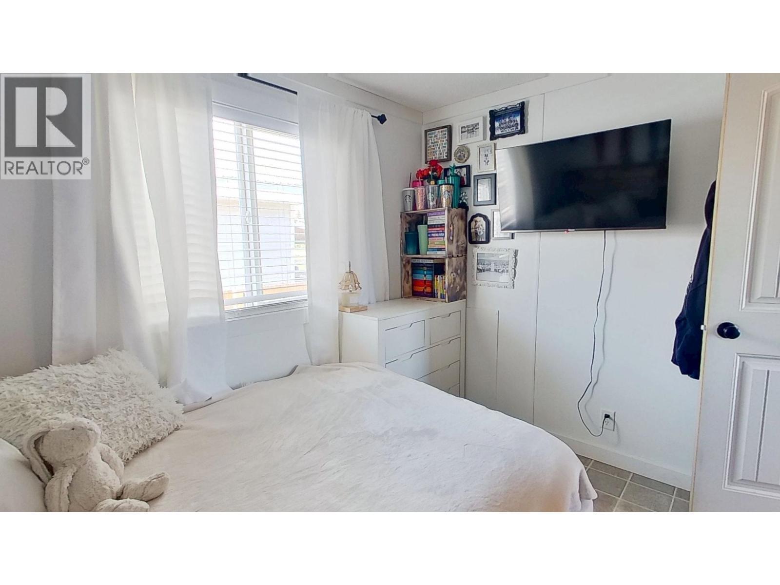 10074 99 Street, Taylor, BC - Indoor Photo Showing Bedroom