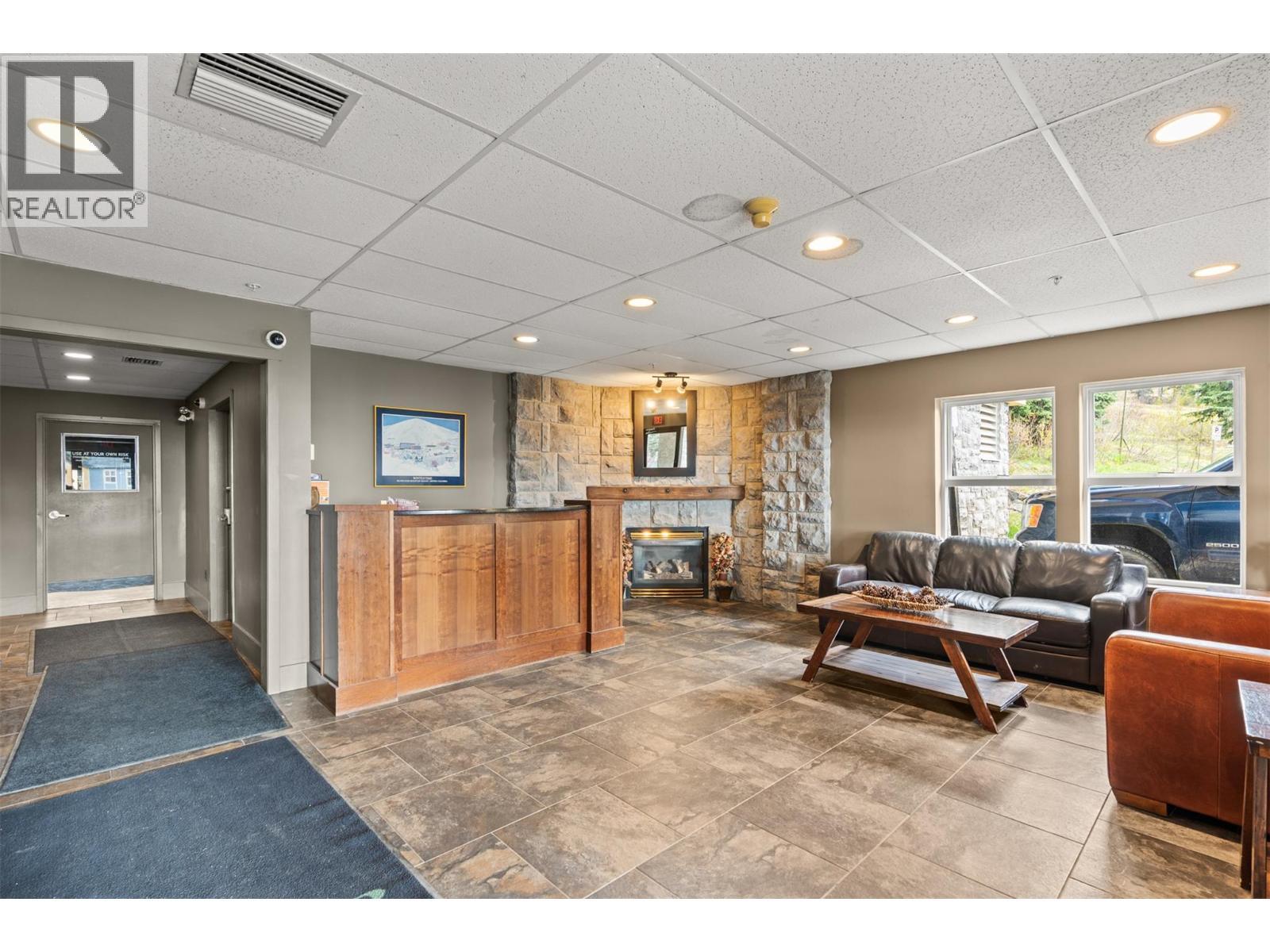 155 Silver Lode Lane Unit# 256, Vernon, BC - Indoor With Fireplace
