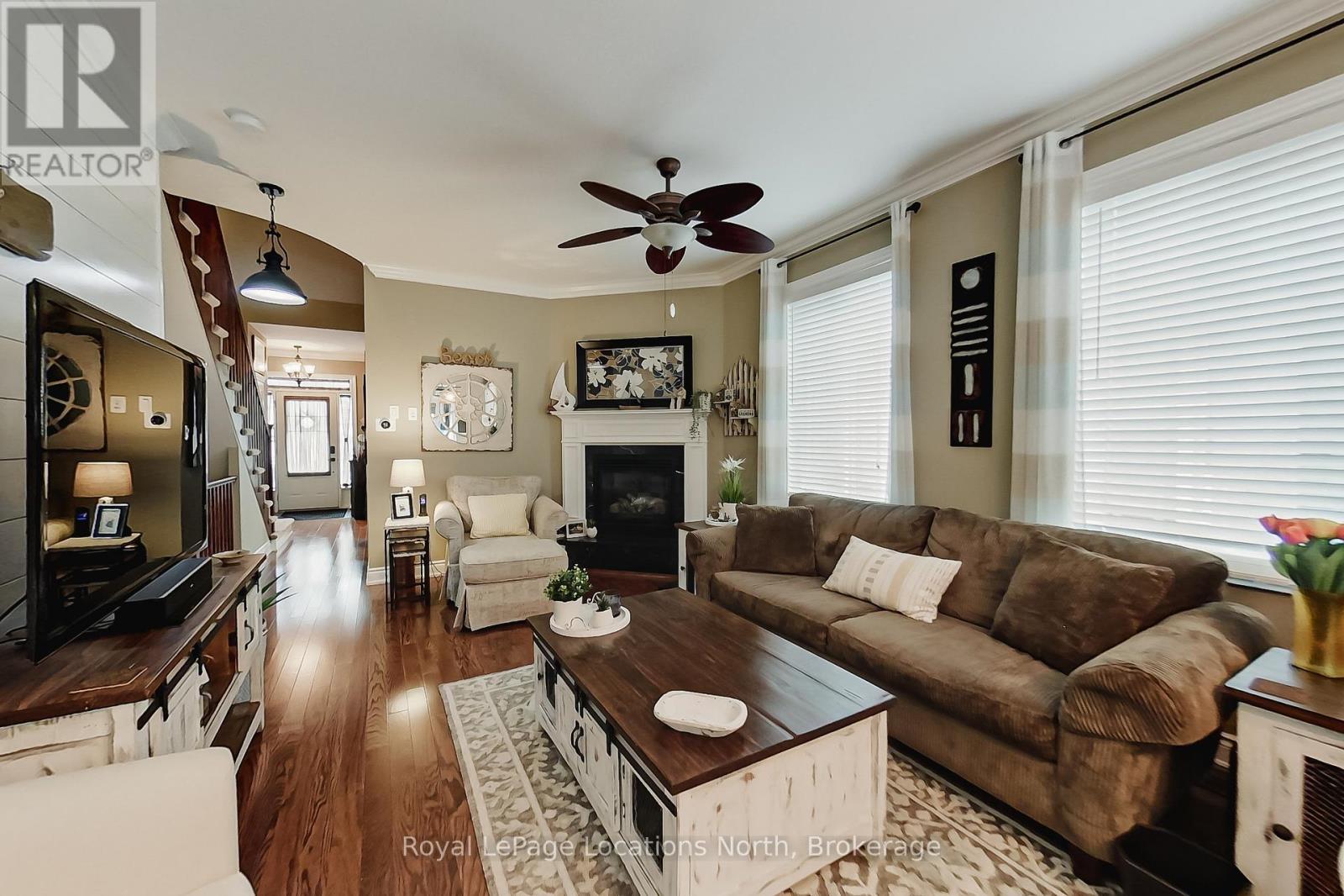 23 Covington Blue Crescent, Wasaga Beach, ON - Indoor Photo Showing Living Room With Fireplace