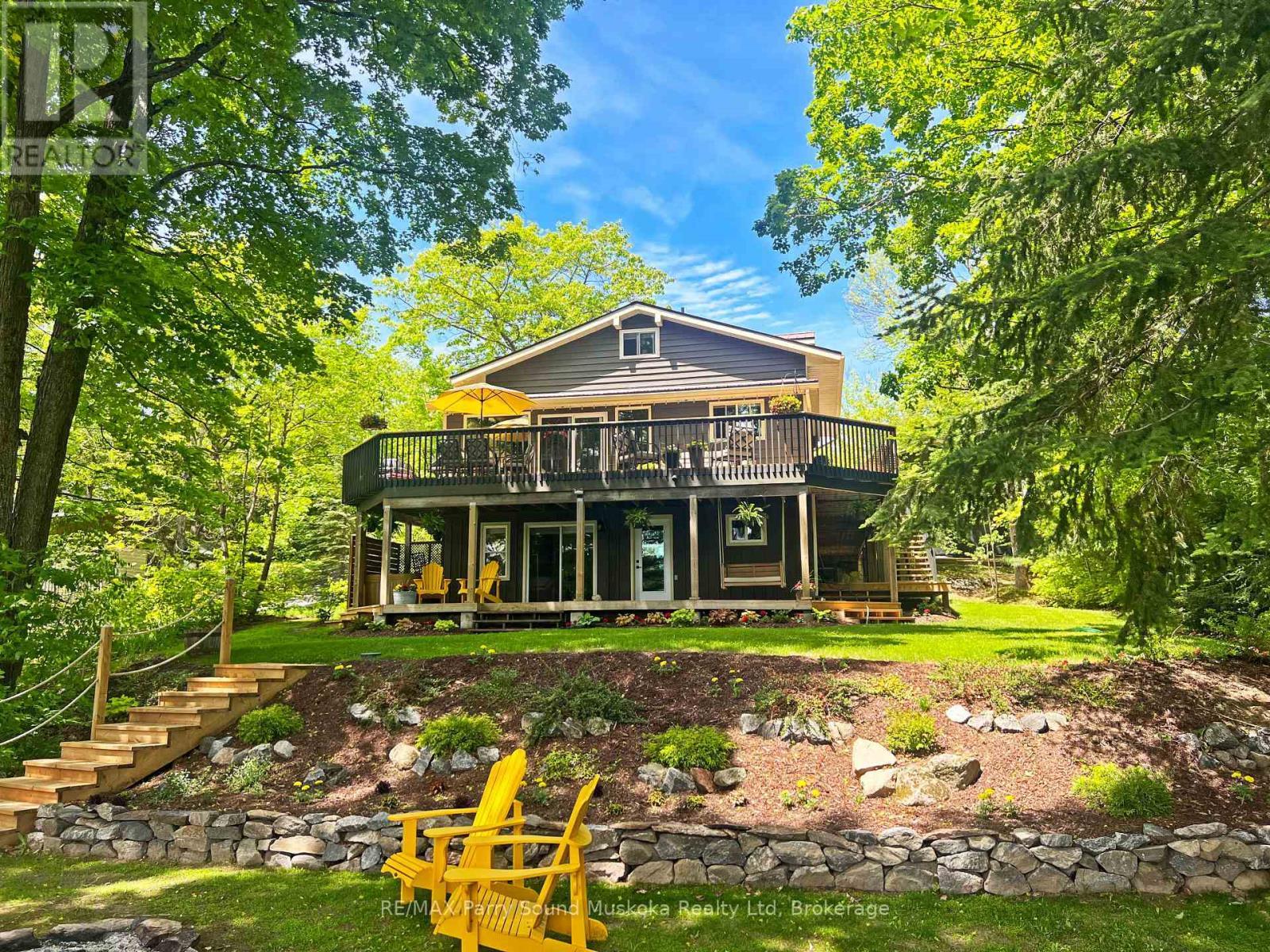 Harris Lake 4 season home or cottage! - 13 Peninsula Shores Road E, Mcdougall, ON - Outdoor With Deck Patio Veranda
