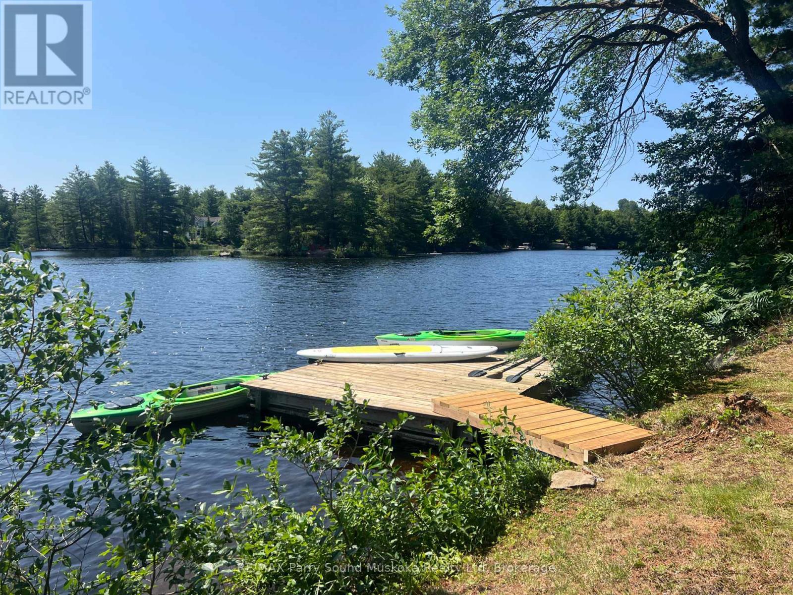 2nd dock ideal kayaks, canoe, paddle board - 13 Peninsula Shores Road E, Mcdougall, ON - Outdoor With Body Of Water