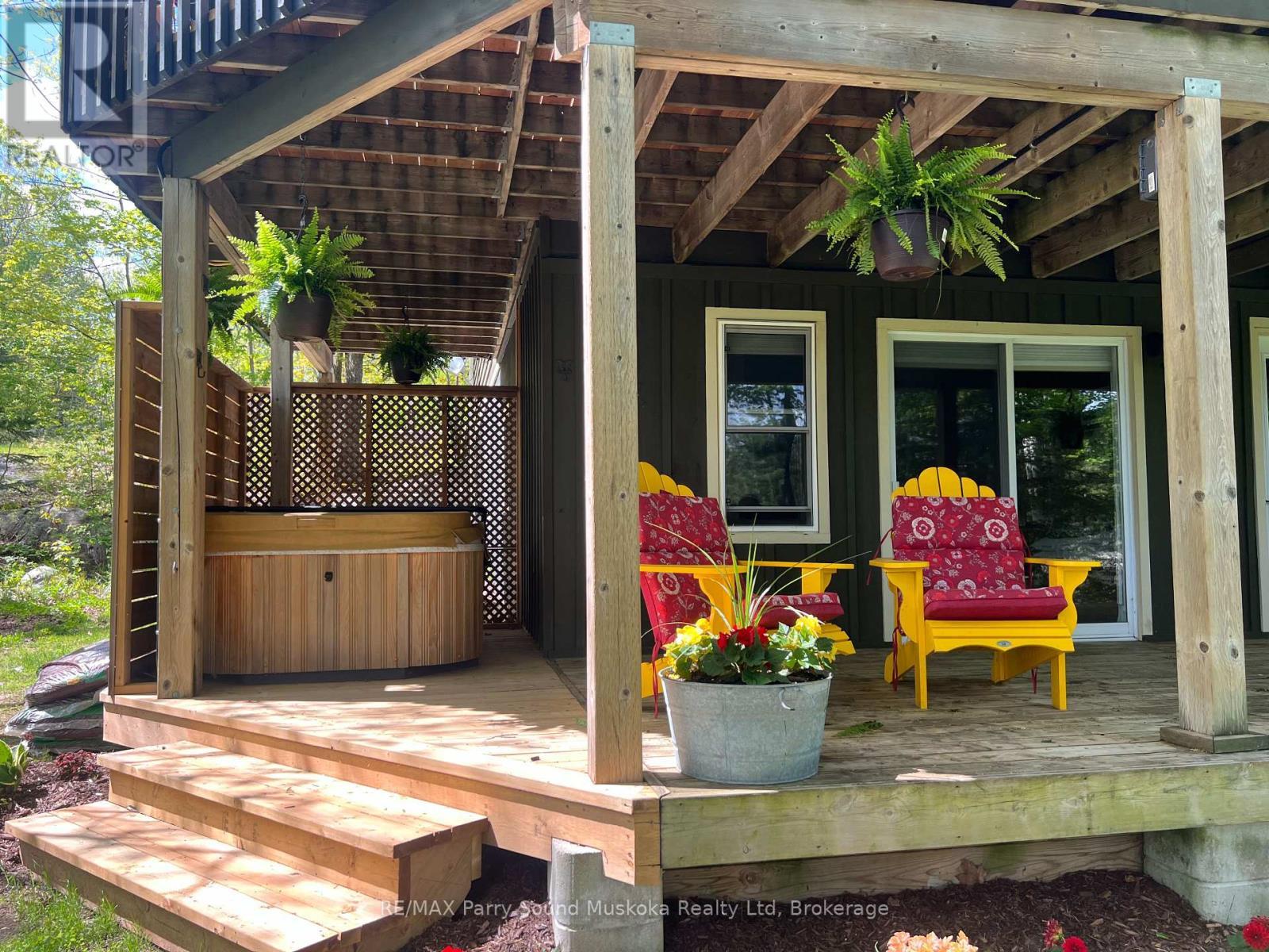 13 Peninsula Shores Road E, Mcdougall, ON - Outdoor With Deck Patio Veranda