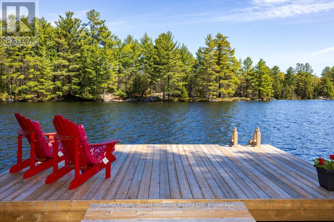 13 Peninsula Shores Road E, Mcdougall, ON - Outdoor With Body Of Water