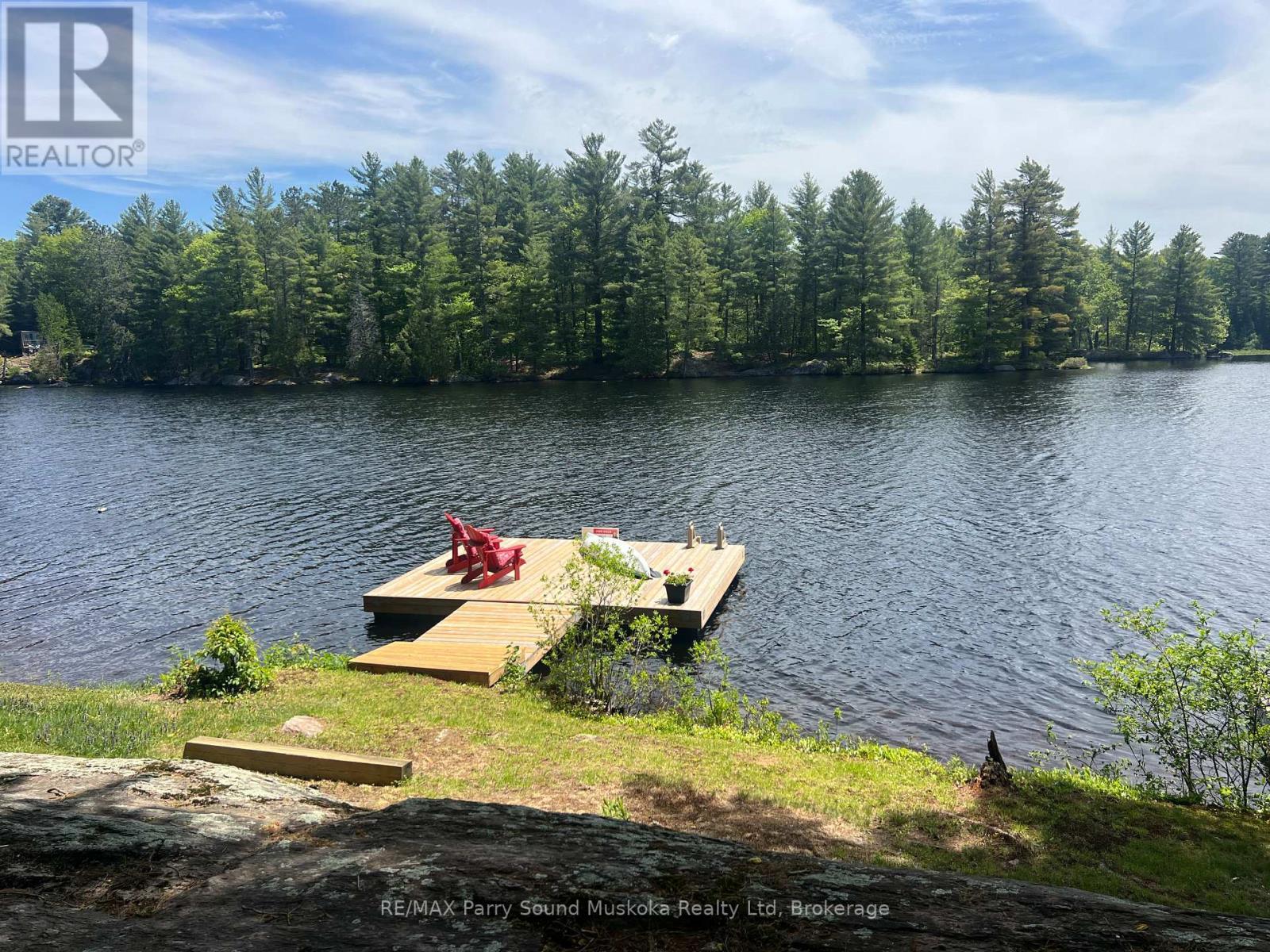 13 Peninsula Shores Road E, Mcdougall, ON - Outdoor With Body Of Water