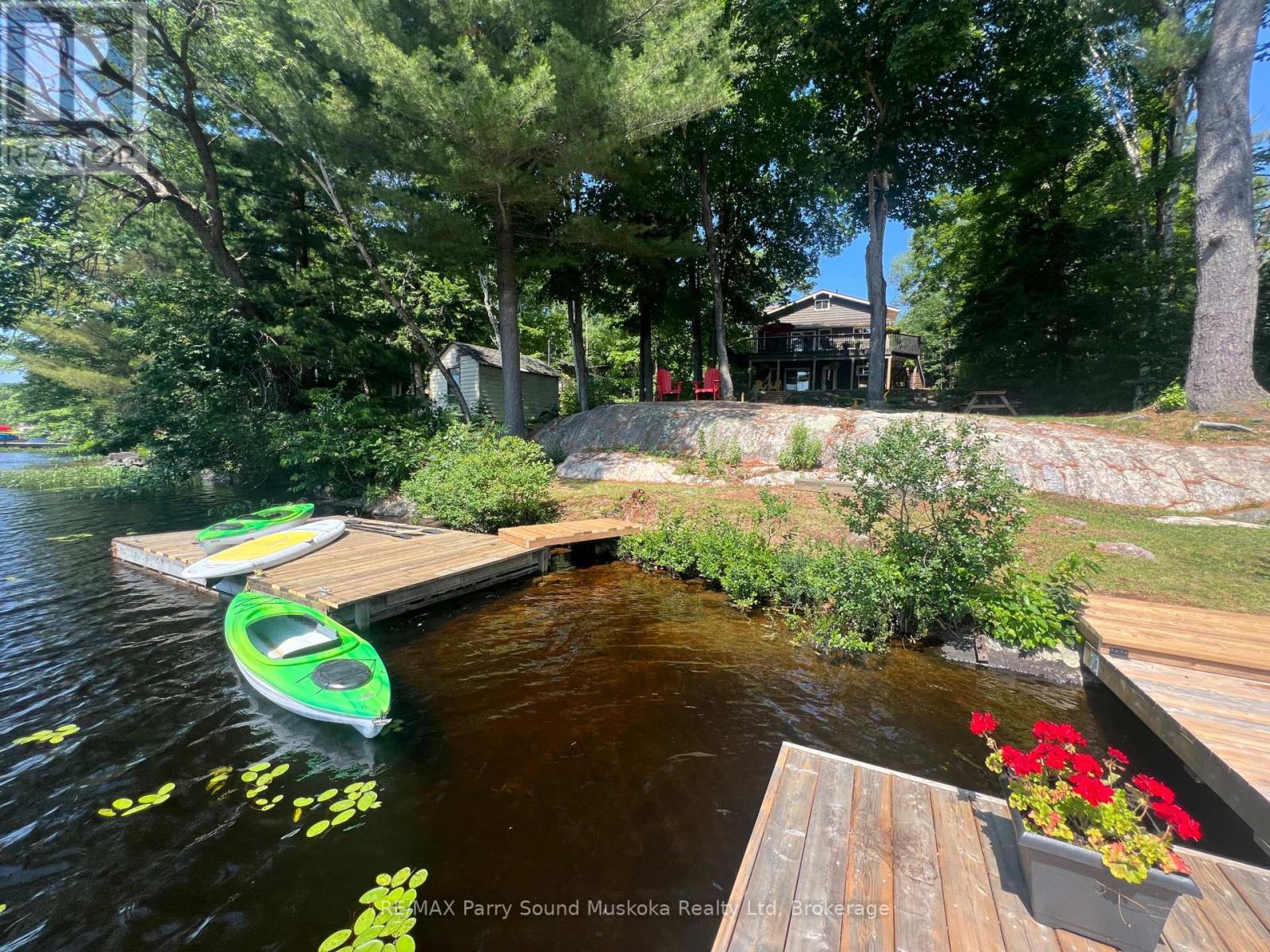 13 Peninsula Shores Road E, Mcdougall, ON - Outdoor With Body Of Water