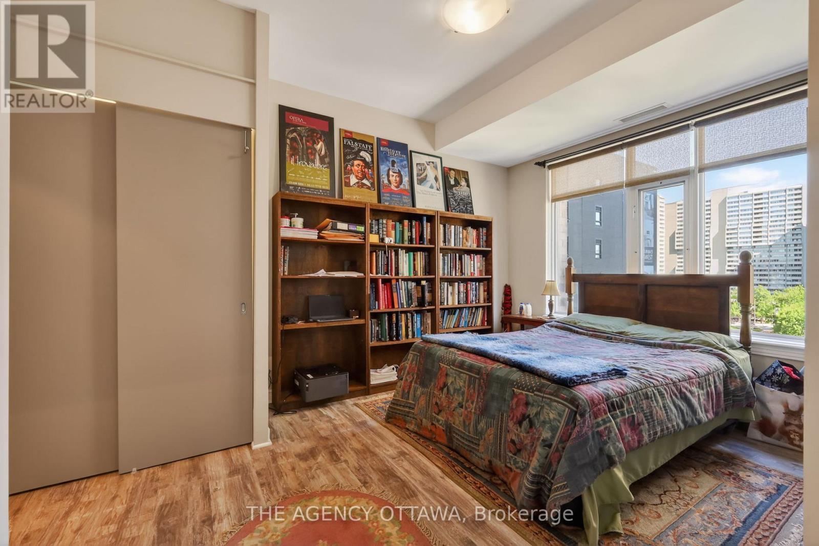 Large bedroom with city courtyard views - 905 - 85 Bronson Avenue, Ottawa, ON - Indoor Photo Showing Bedroom