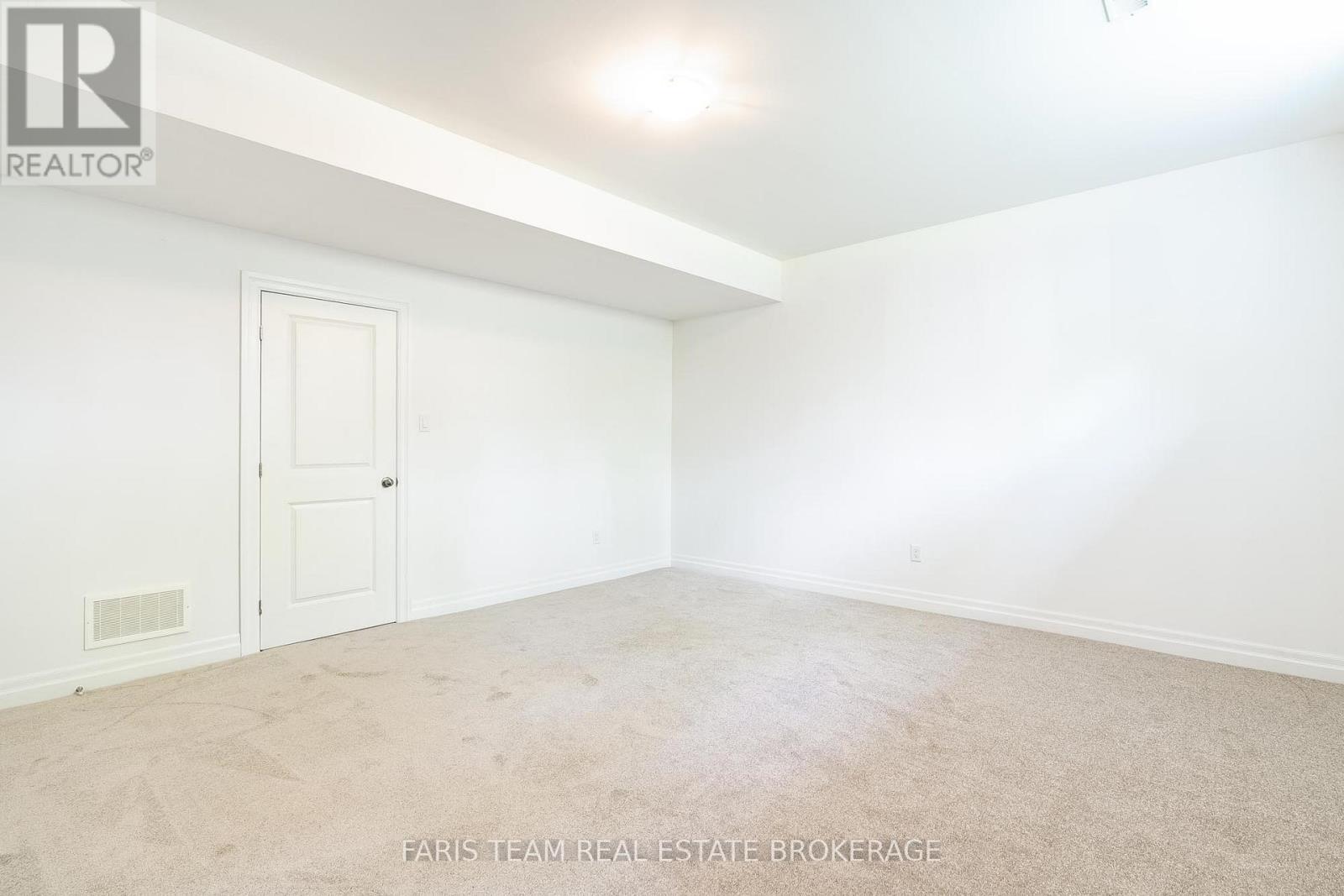 470 Baseline Road S, Tiny, ON - Indoor Photo Showing Other Room
