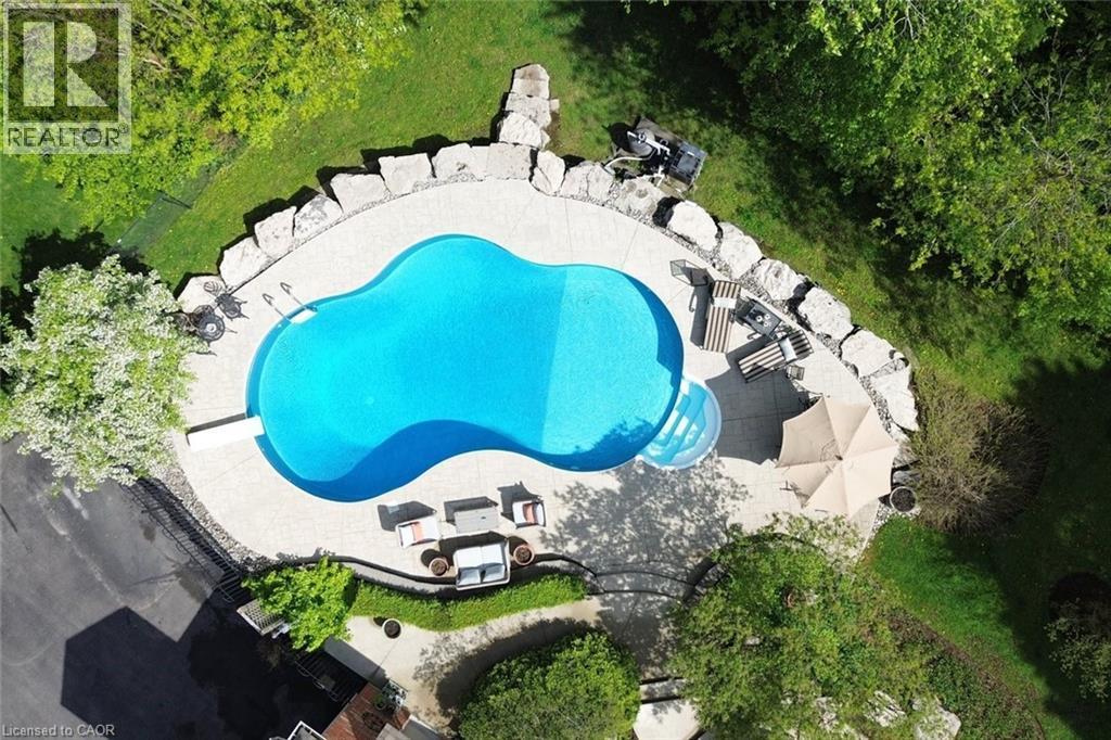 712 Robson Road, Waterdown, ON - Outdoor With In Ground Pool
