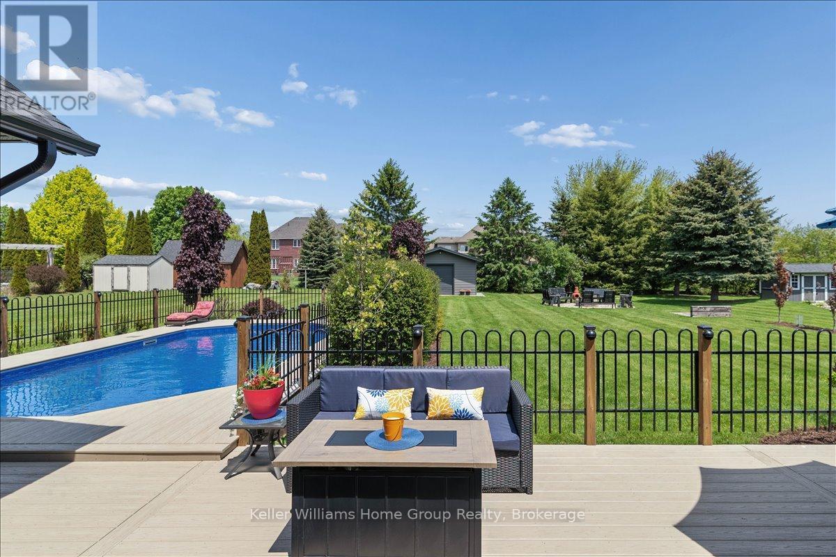 8 Stonefield Drive, Woolwich, ON - Outdoor With In Ground Pool With Deck Patio Veranda