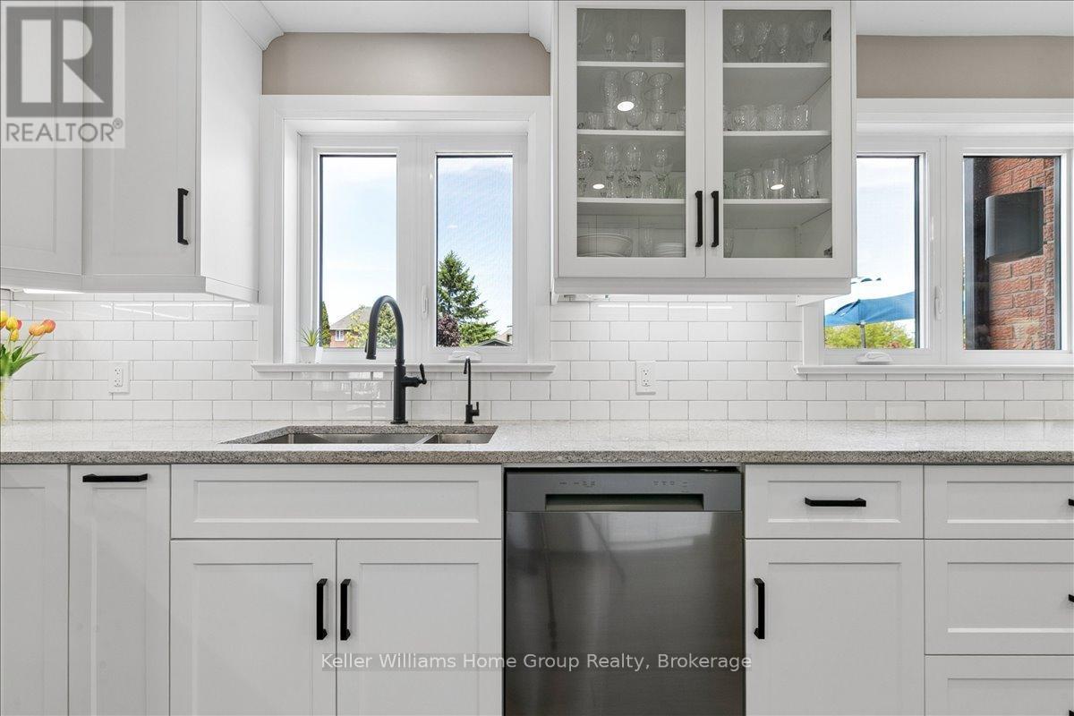 8 Stonefield Drive, Woolwich, ON - Indoor Photo Showing Kitchen With Double Sink