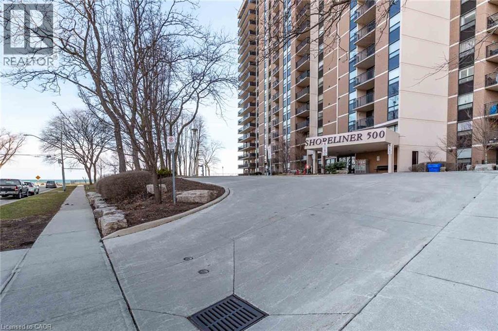 Modern high-rise building featuring a prominent ""Shopeliner 500"" entrance sign - 500 Green Road Unit# 901, Stoney Creek, ON - Outdoor With Balcony