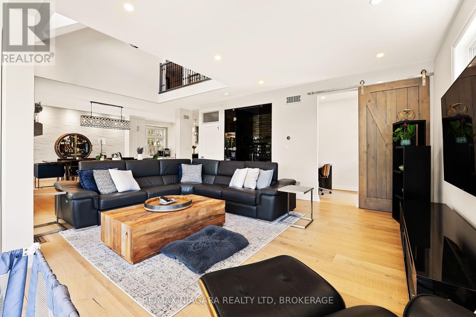 Living Area with Wine Room and Office Nook - 1448 Four Mile Creek Road, Niagara-On-The-Lake (Virgil), ON - Indoor Photo Showing Living Room
